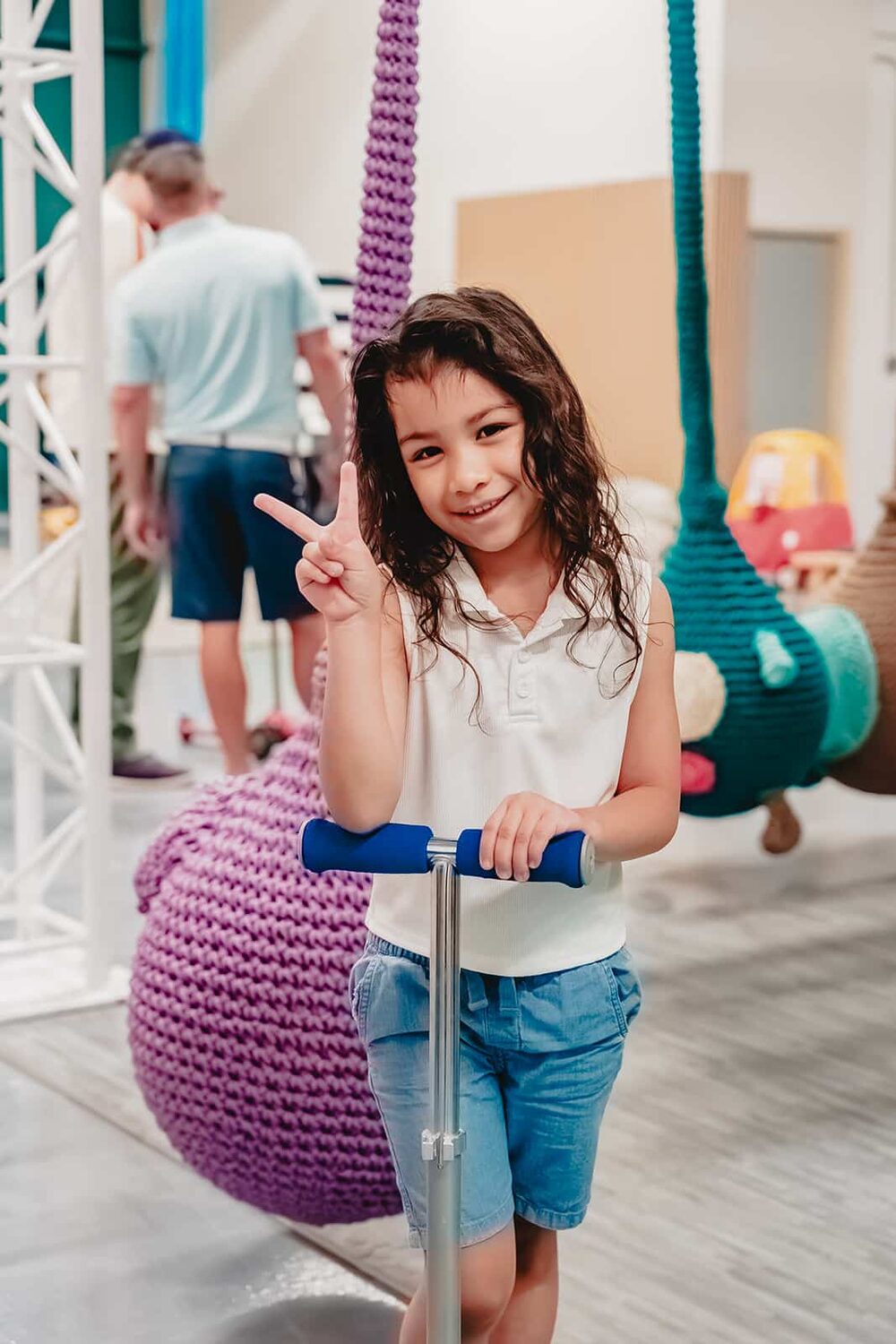 Occupational therapy on a sensory swing at Prana Play